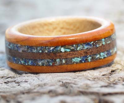 Shells and gemstones in a wooden ring